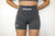 Model Anjelica is 5'4 wearing a size M in ICONIC WAIST SCULPTING SHORTS